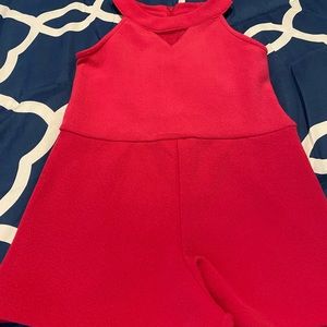 Hot pink one piece top and shorts. Never worn and lost tags..